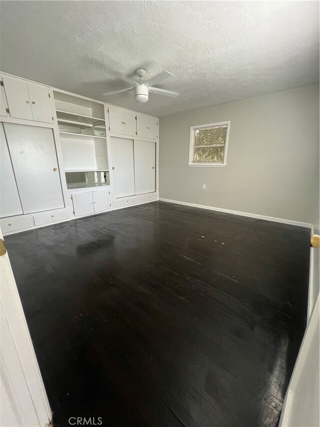 2202 Bedford Way, Bakersfield, CA 93308 - interior space with ceiling fan, hardwood / wood-style flooring, and a textured ceiling