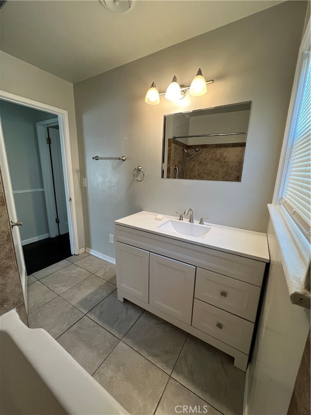 2202 Bedford Way, Bakersfield, CA 93308 - bathroom featuring bathtub / shower combination, tile patterned flooring, and vanity