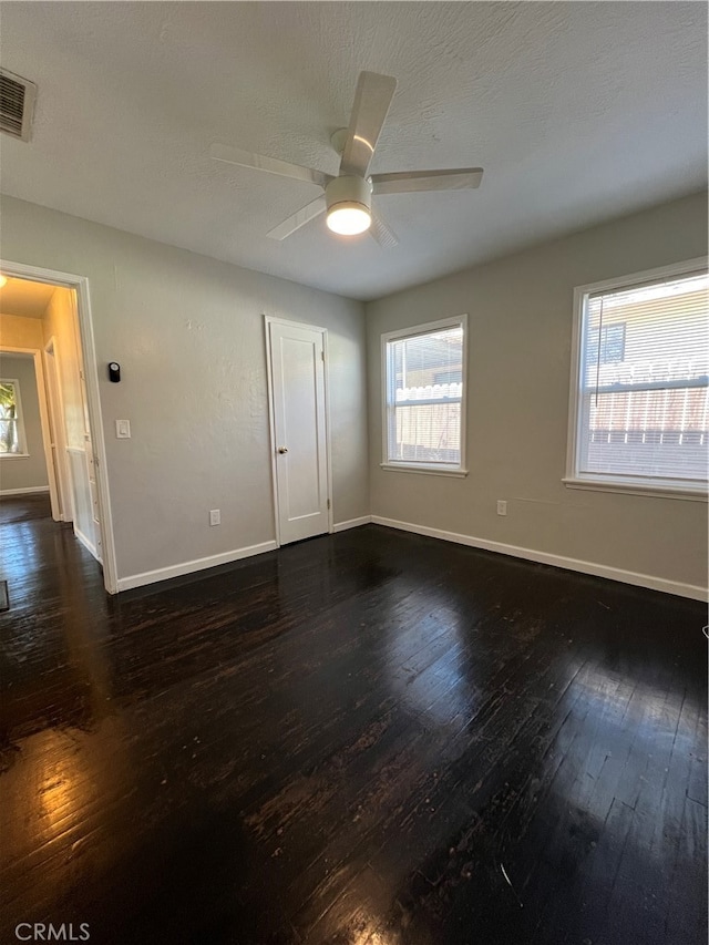2202 Bedford Way, Bakersfield, CA 93308 - spare room featuring dark wood-type flooring and ceiling fan