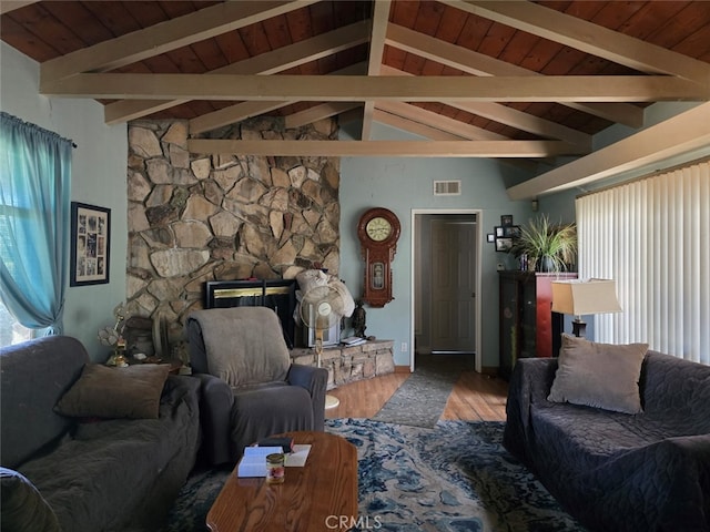 living room featuring wood ceiling, high vaulted ceiling, beamed ceiling, and hardwood / wood-style floors