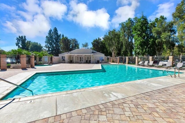 23556 Cambridge Rd Unit 327, Yorba Linda, CA 92887 - pool featuring fence and a patio area