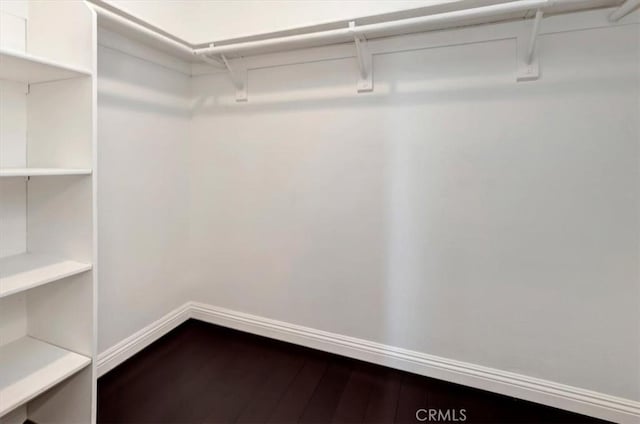 23556 Cambridge Rd Unit 327, Yorba Linda, CA 92887 - spacious closet featuring dark wood-style flooring