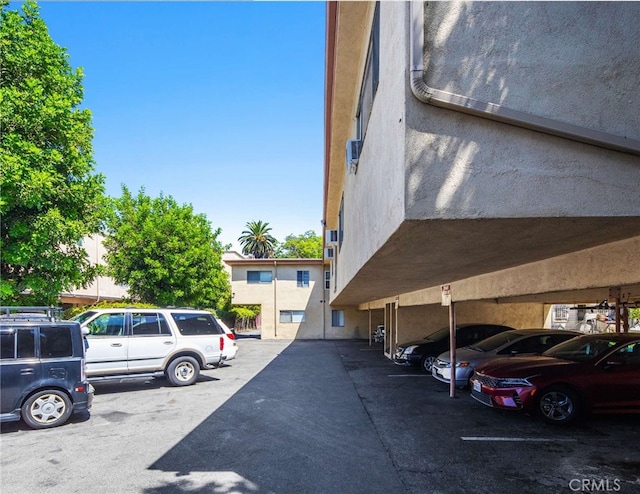 view of parking with a carport