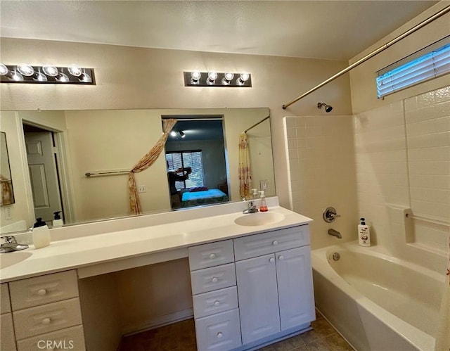 bathroom with tile patterned flooring, vanity, and shower / tub combo