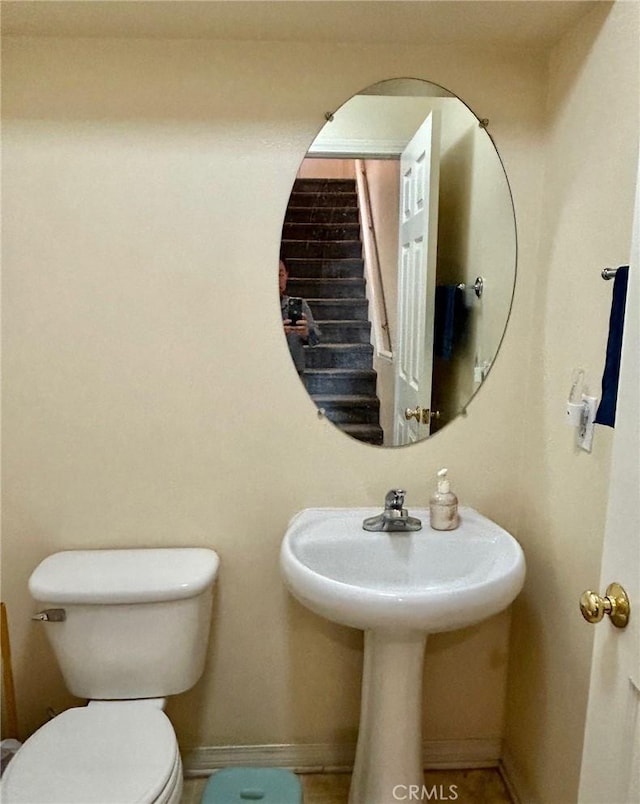 bathroom featuring toilet