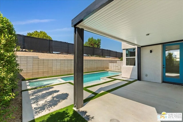 view of pool with a patio area