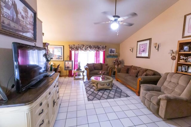 tiled living room with ceiling fan and lofted ceiling