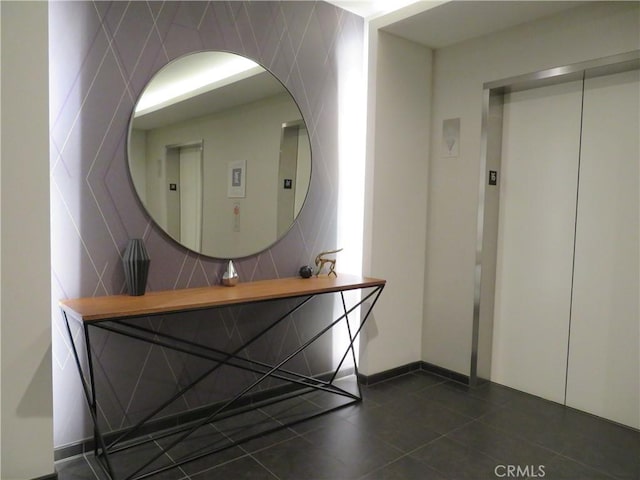 889 Francisco St Unit 1609, Los Angeles, CA 90017 - bathroom featuring elevator and tile patterned flooring
