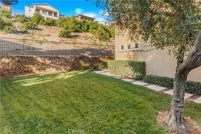 view of yard with fence