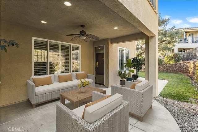 view of patio with ceiling fan and an outdoor hangout area