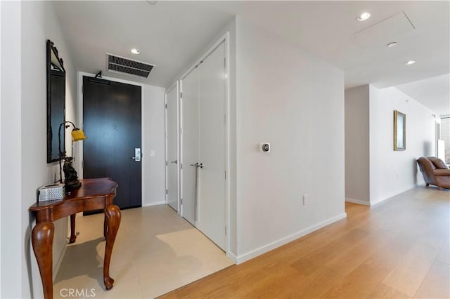 hall featuring light wood-type flooring