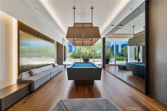 playroom featuring wood-type flooring, a wall of windows, and pool table