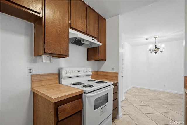 kitchen with hanging light fixtures, light tile patterned floors, white range with electric stovetop, and a chandelier