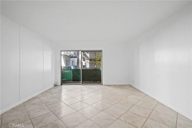 empty room featuring light tile patterned floors