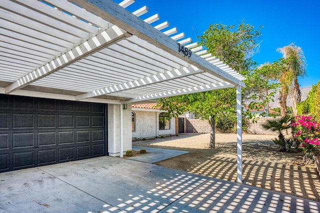 view of patio with a garage