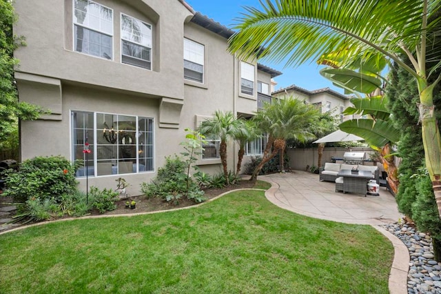 view of yard featuring a patio and an outdoor hangout area