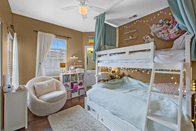 bedroom featuring ceiling fan and dark hardwood / wood-style flooring