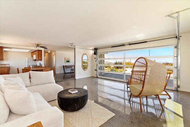 living room with ceiling fan