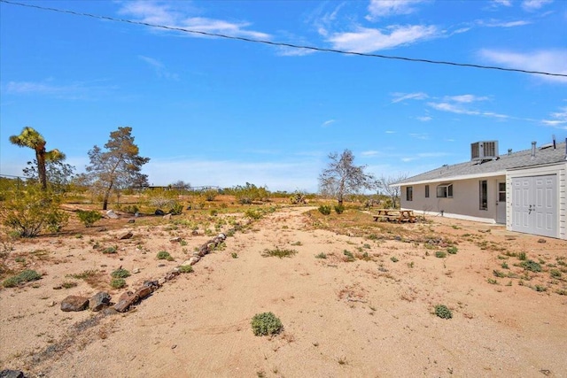 view of yard featuring cooling unit