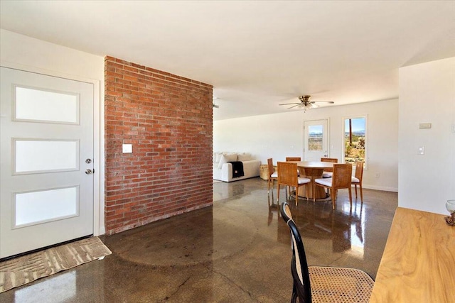 dining room featuring ceiling fan