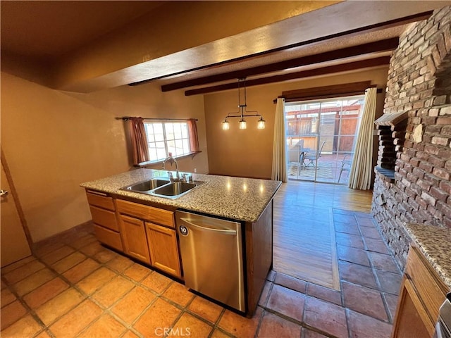 kitchen with pendant lighting, beamed ceiling, an island with sink, sink, and stainless steel dishwasher