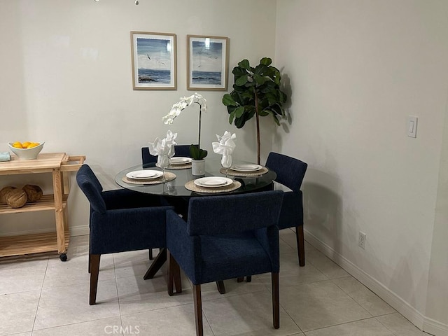 dining room featuring light tile patterned floors