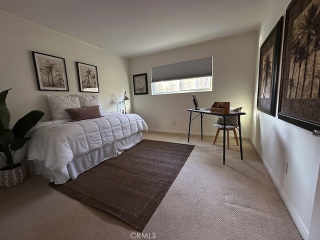 bedroom featuring light colored carpet