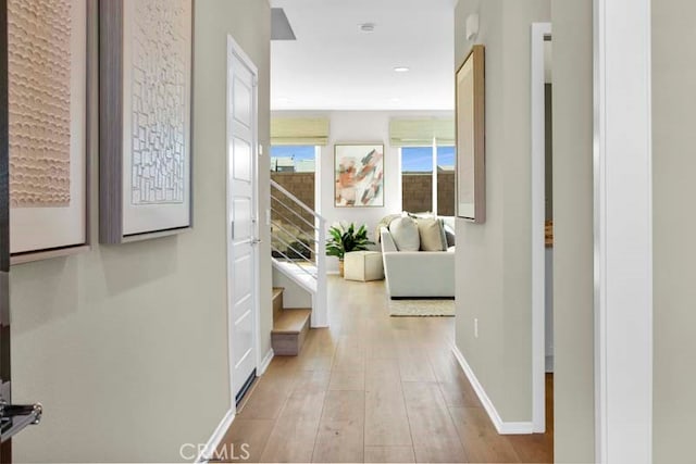 corridor featuring light hardwood / wood-style floors