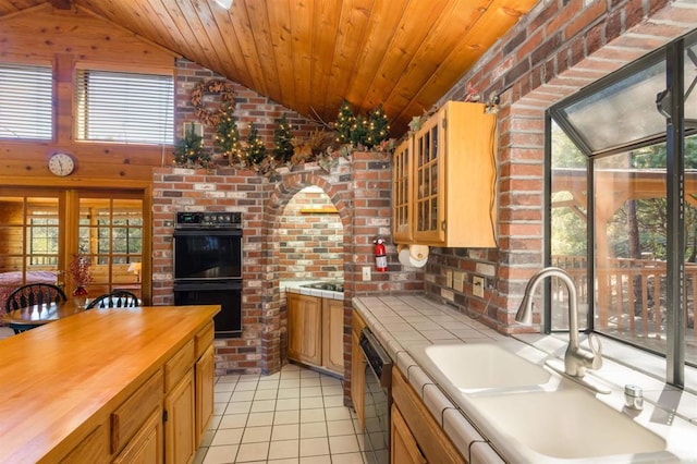 kitchen featuring vaulted ceiling, light tile patterned floors, wooden ceiling, and black appliances