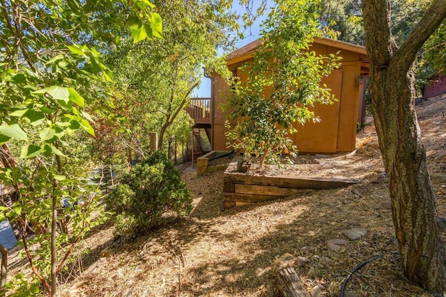 view of yard featuring a deck