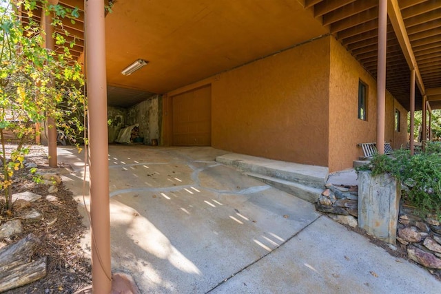 view of patio with a carport