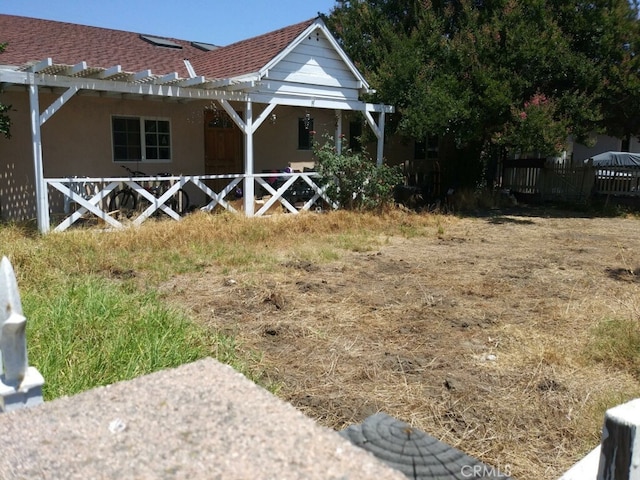 exterior space featuring a pergola