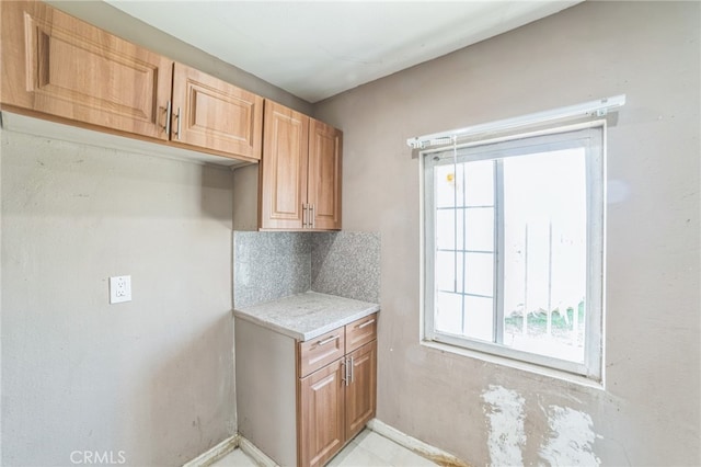 kitchen featuring tasteful backsplash