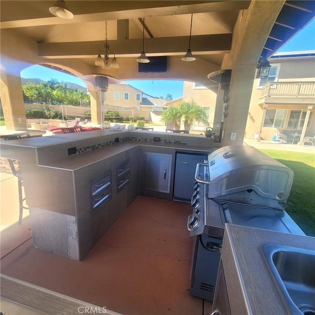 3887 Via Zumaya St, Corona, CA 92881 - view of patio / terrace with an outdoor kitchen