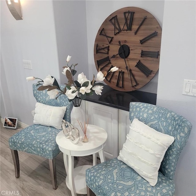 3887 Via Zumaya St, Corona, CA 92881 - living area featuring wood finished floors and baseboards
