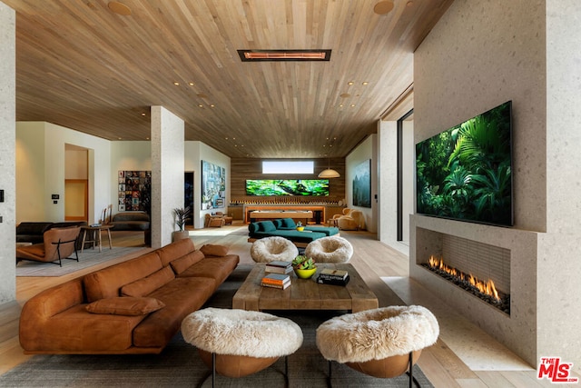 interior space featuring wood ceiling and light hardwood / wood-style flooring