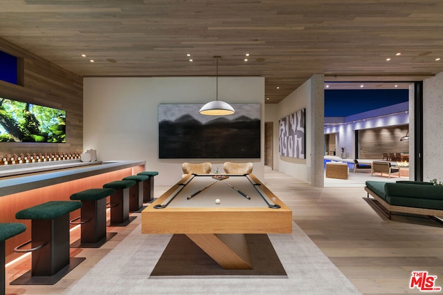 playroom with light wood-type flooring, indoor bar, billiards, and wooden ceiling