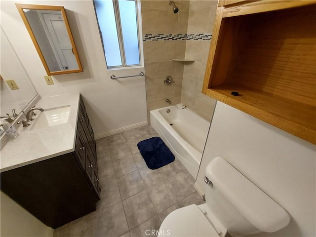 full bathroom with tile patterned floors, vanity, toilet, and tiled shower / bath combo