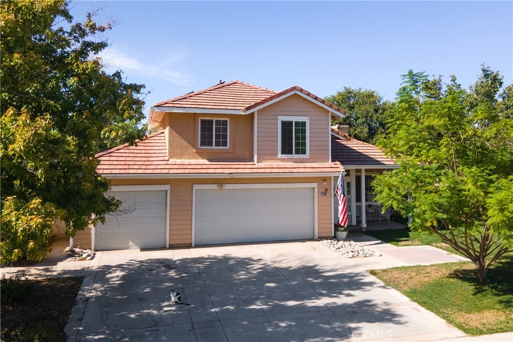 view of property featuring a garage