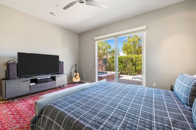 bedroom with access to exterior and ceiling fan