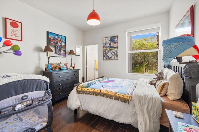 bedroom featuring dark hardwood / wood-style floors