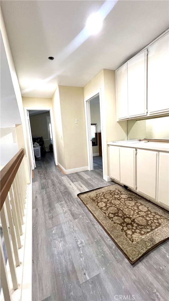 corridor featuring hardwood / wood-style flooring