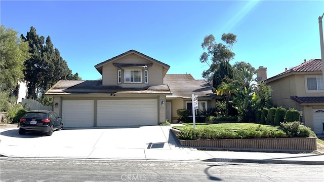 front facade with a front lawn