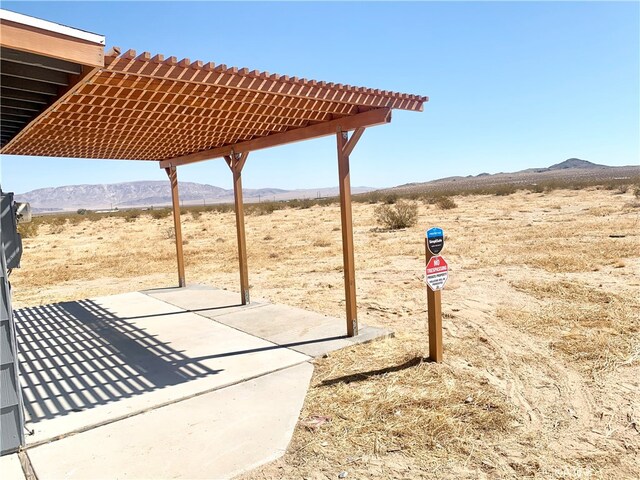 surrounding community featuring a mountain view