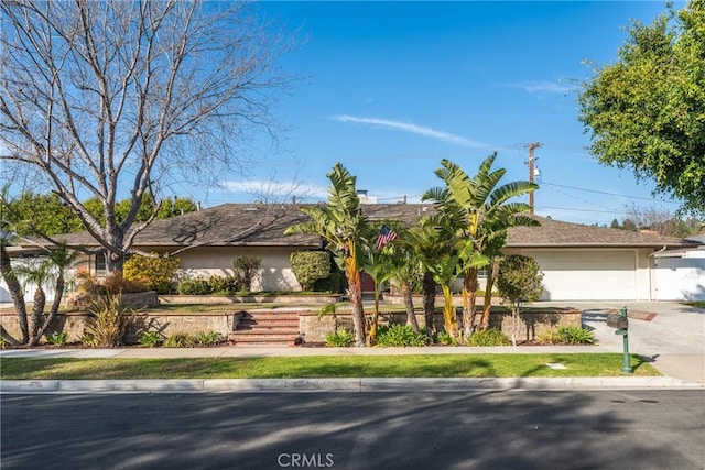 single story home with a garage