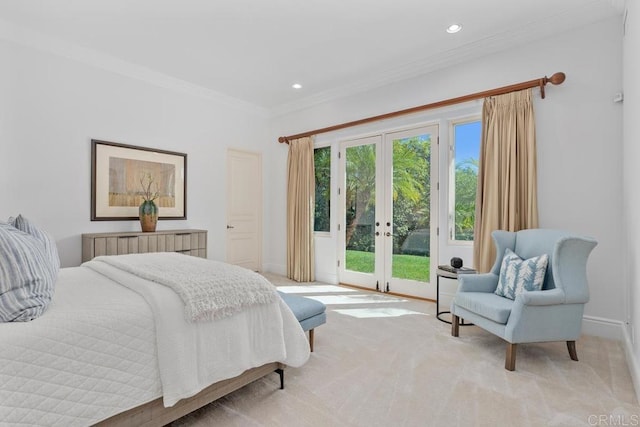 carpeted bedroom with french doors, crown molding, and access to exterior