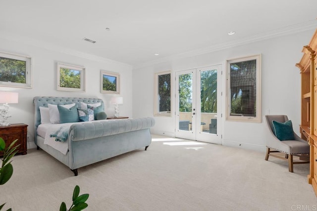 bedroom with french doors, light colored carpet, and access to outside