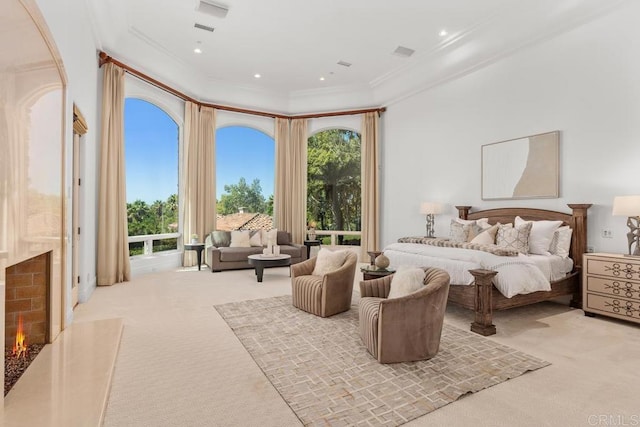 bedroom featuring crown molding and light carpet