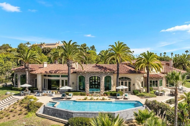 view of pool with a patio