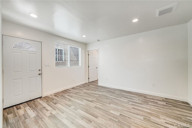 entrance foyer with light hardwood / wood-style floors